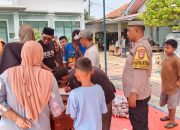 Bhabinkamtibmas Desa Karang Patri Aiptu Abdurahman Kawal Pembagian 420 Paket Daging Kurban